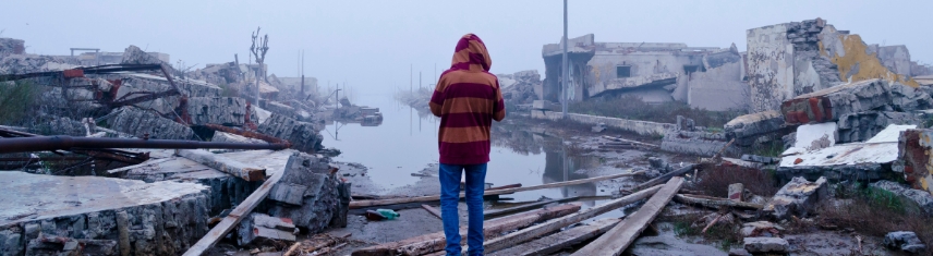 Man viewing flood damage